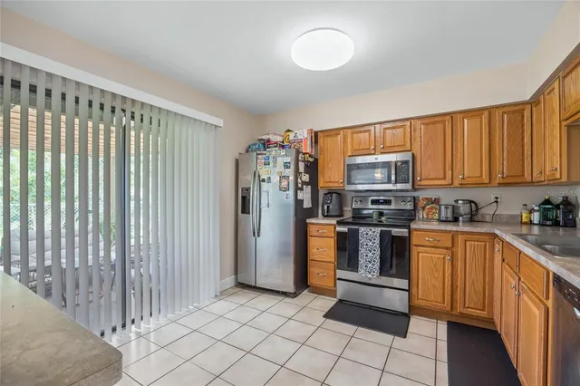 a view of swimming pool with garden and seating area