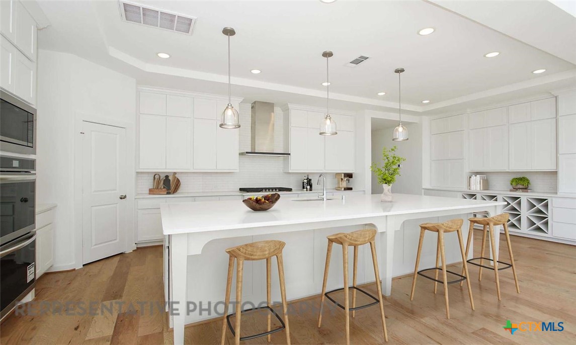 108 Ribera Drive Liberty Hill, TX 78642 - Photo 2 of 27 Kitchen - Virtually Staged