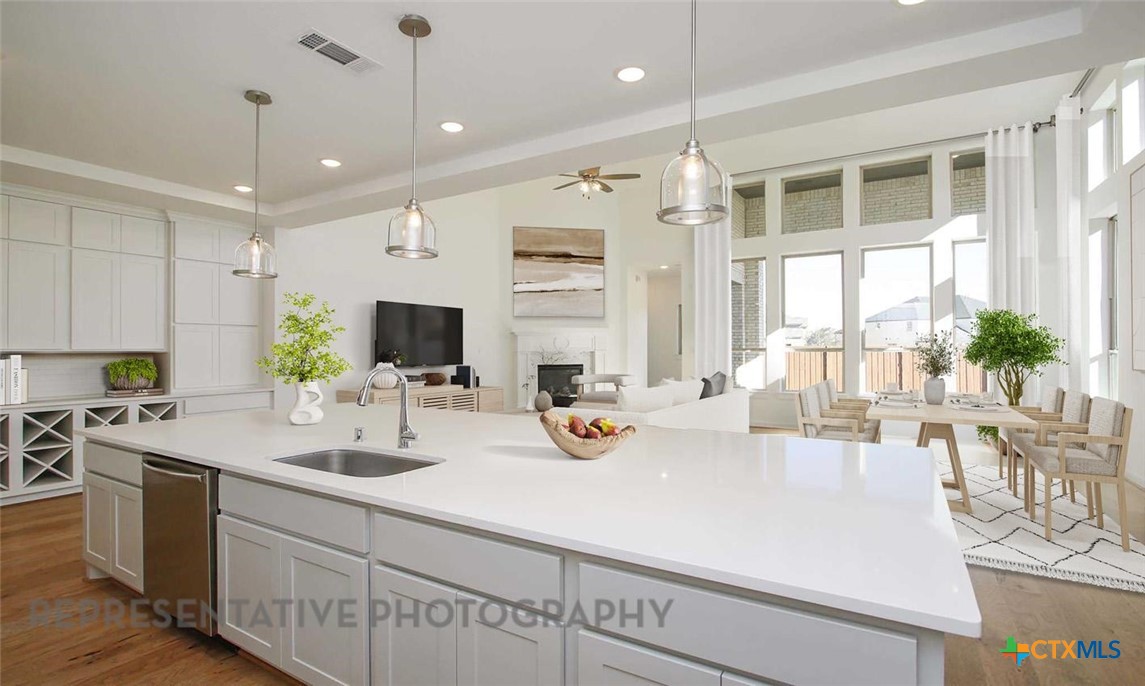 108 Ribera Drive Liberty Hill, TX 78642 - Photo 3 of 27 Kitchen - Virtually Staged