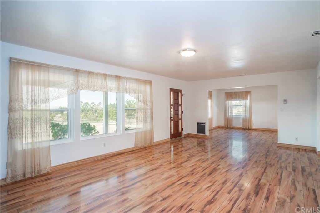 17301 Santa Rosa Mine Road Perris, CA 92570 - Photo 6 of 42 Livingroom and formal dining room