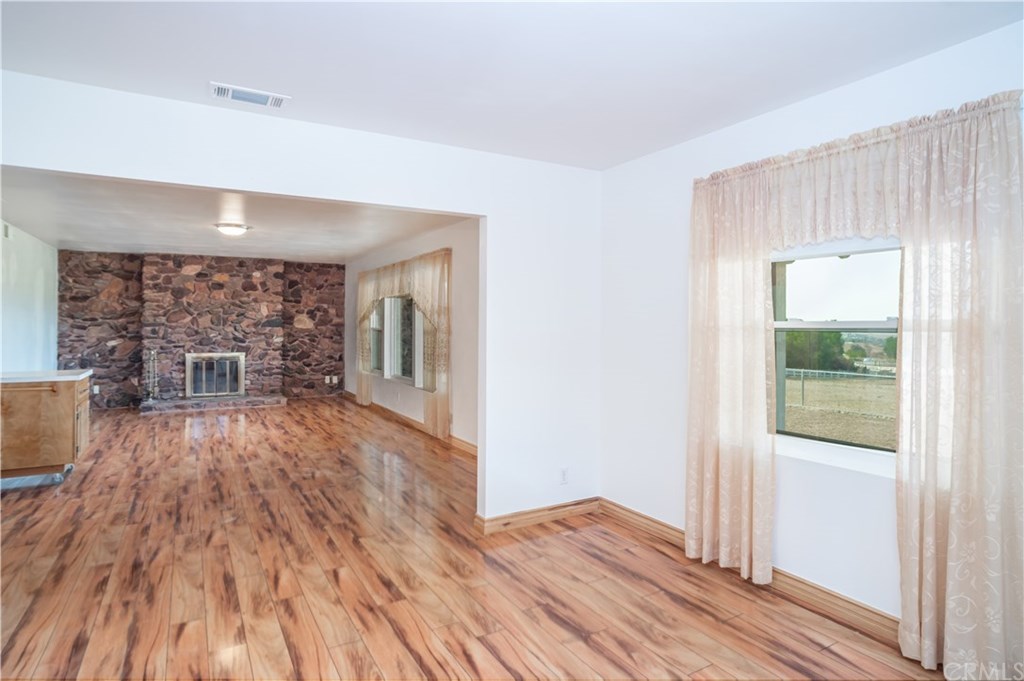 17301 Santa Rosa Mine Road Perris, CA 92570 - Photo 8 of 42 Dining room to living room view
