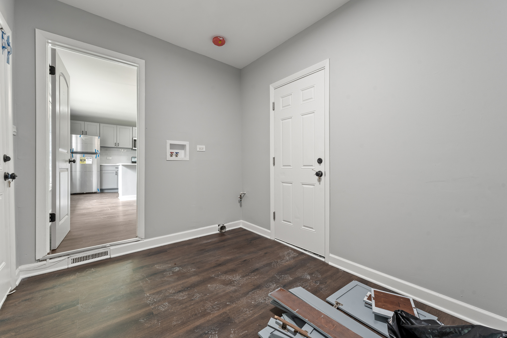 Undisclosed Address Hazel Crest, IL 60429 - Photo 12 of 23 an empty room with wooden floor