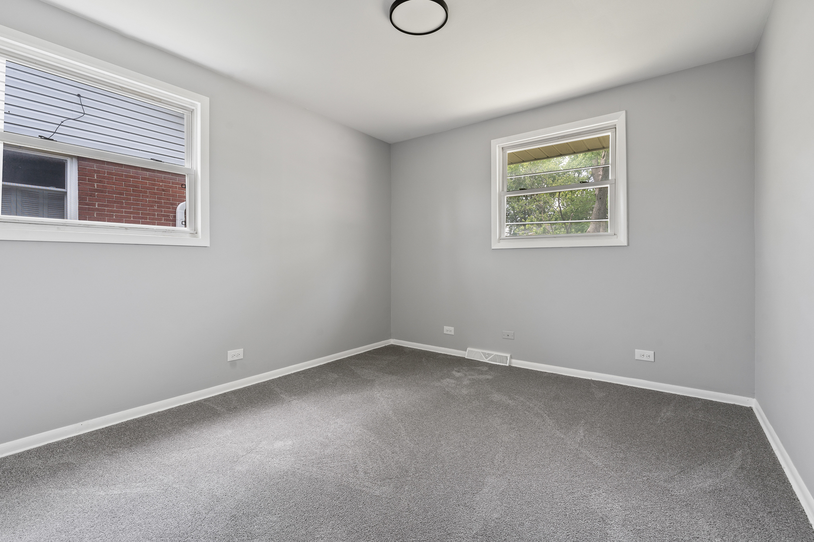 Undisclosed Address Hazel Crest, IL 60429 - Photo 15 of 23 an empty room with windows