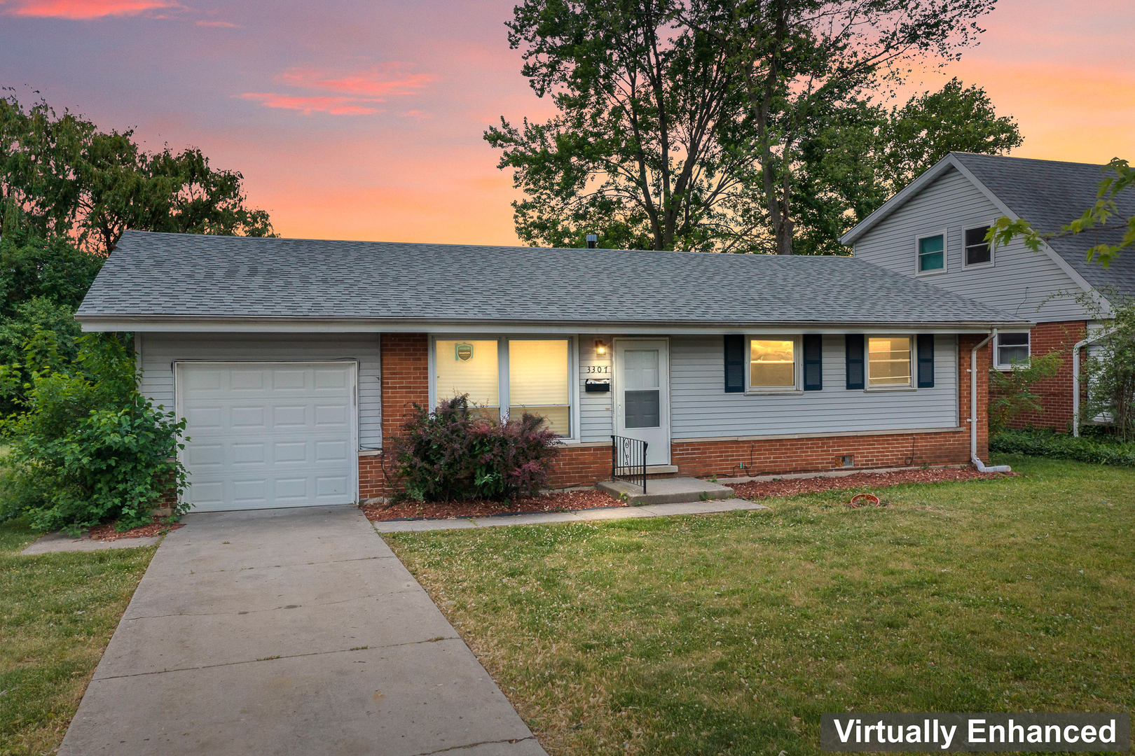 Undisclosed Address Hazel Crest, IL 60429 - Photo 21 of 23 a front view of a house with a yard and trees