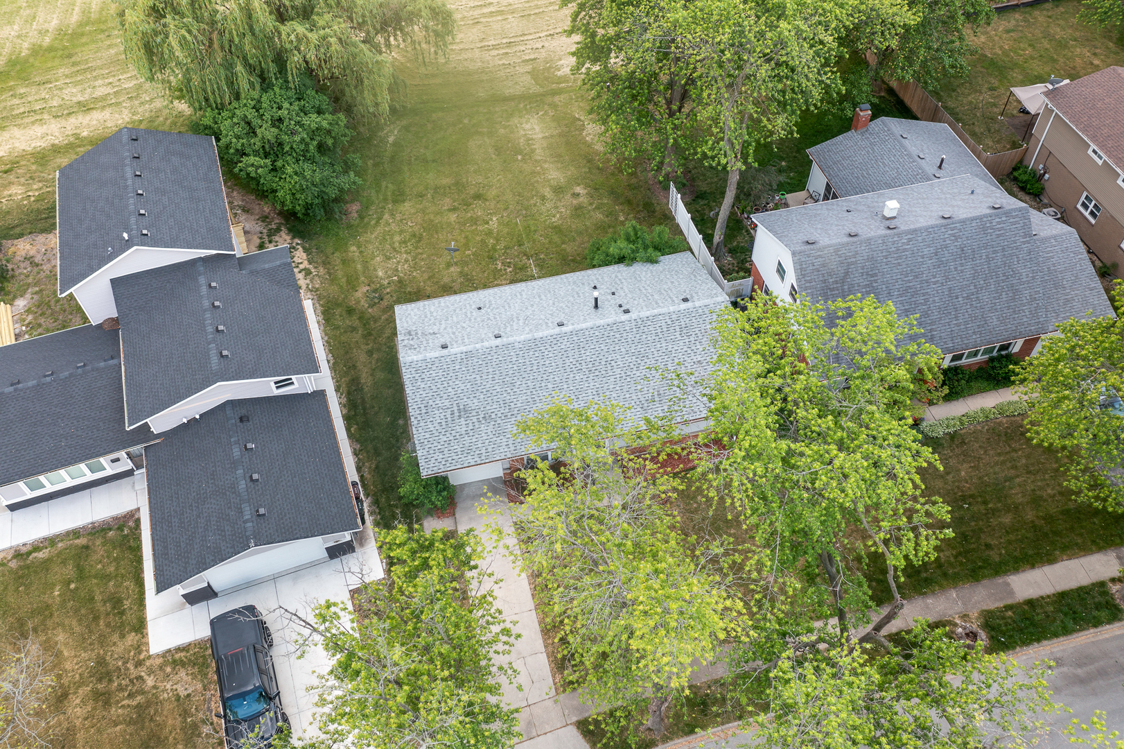 Undisclosed Address Hazel Crest, IL 60429 - Photo 22 of 23 an aerial view of a house with a garden