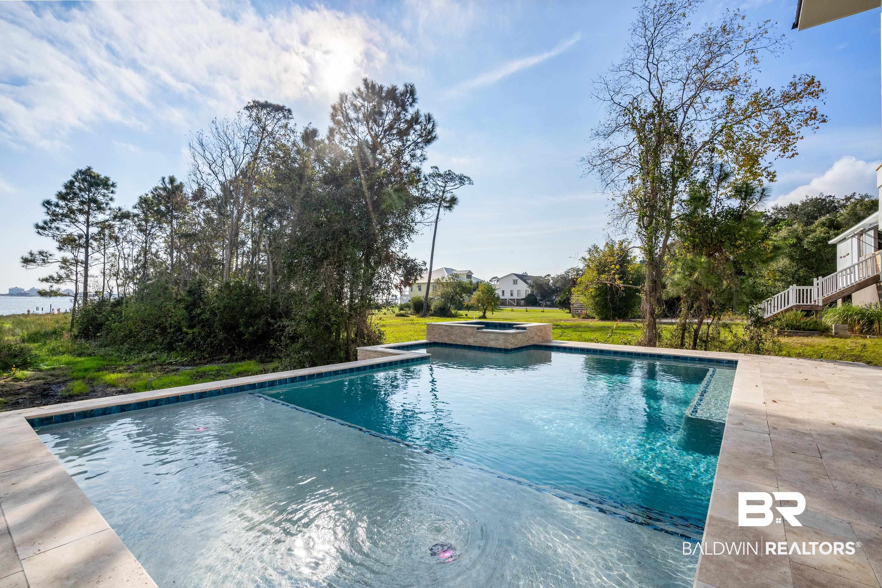 14686 State Highway Gulf Shores, AL 36542 - Photo 12 of 44 View of pool featuring an in ground hot tub and a patio