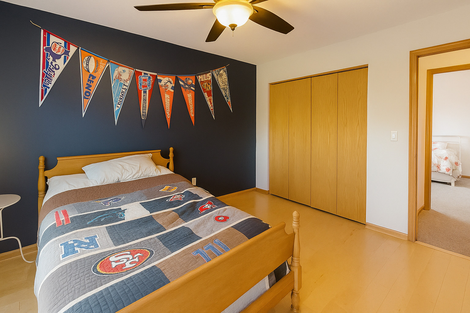 246 West Winding Trail Circle Round Lake, IL 60073 - Photo 16 of 26 a bedroom with a bed and a chandelier