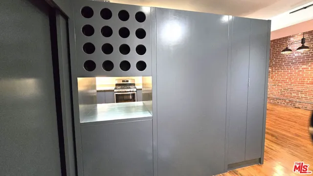 a bedroom with a large bed and a table