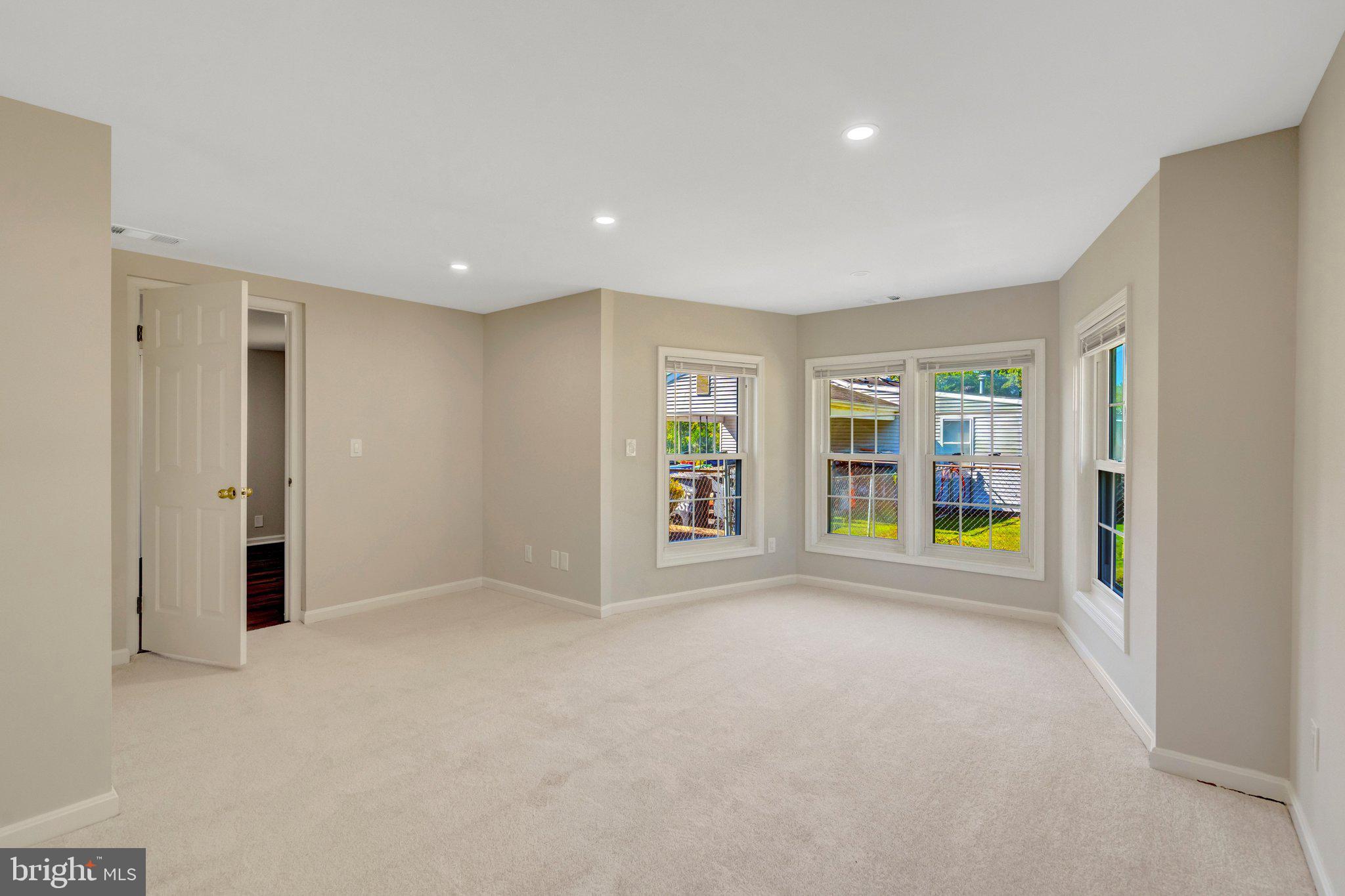 9008 Rugby Road Manassas Park, VA 20111 - Photo 22 of 39 Bedroom 2 with new carpet and recessed lights