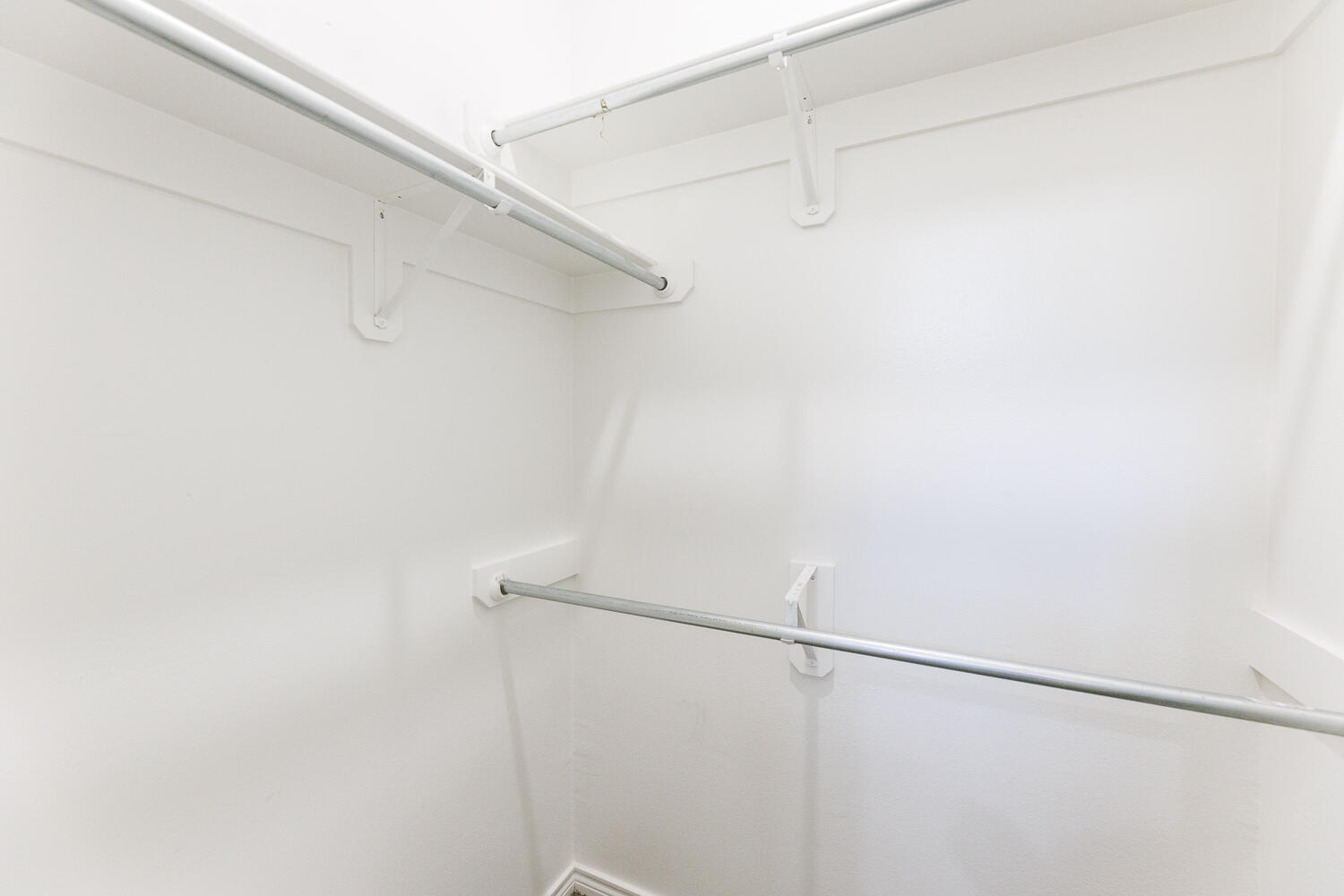 7619 59th Street Lubbock, TX 79407 - Photo 21 of 33 a view of a room with racks on the wall