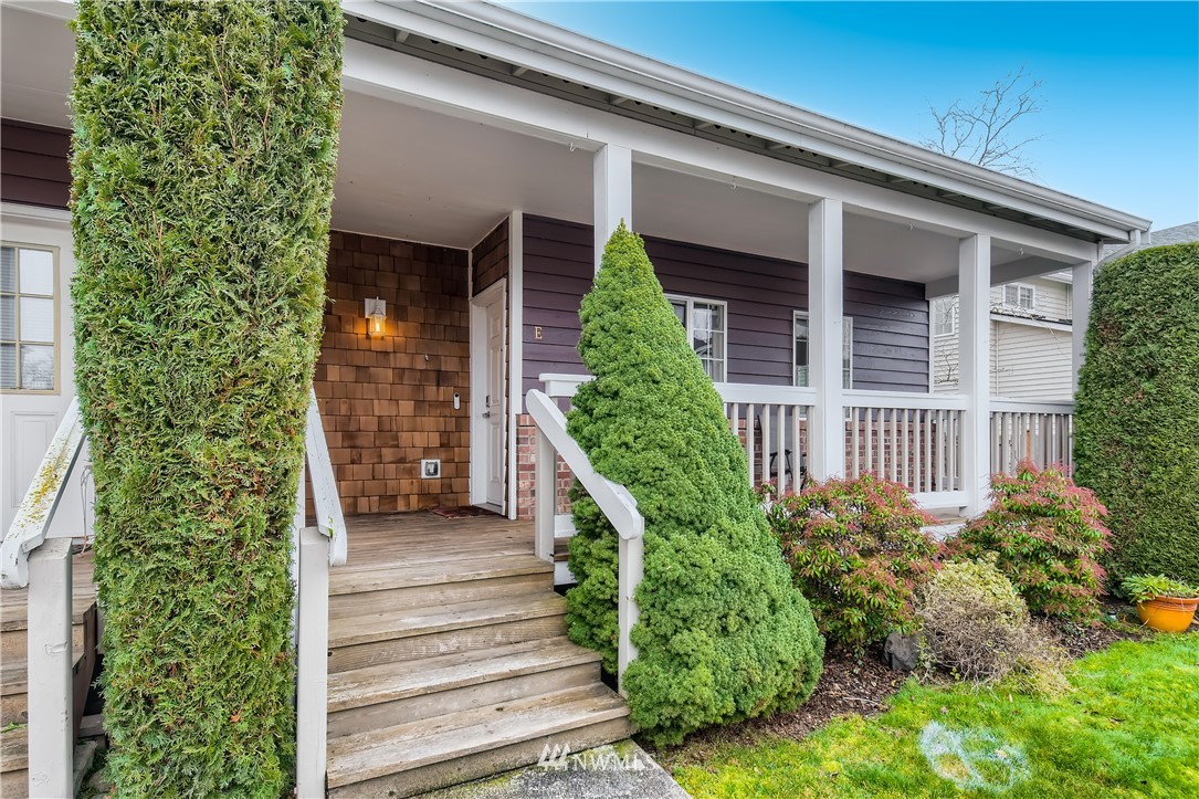 2750 Diamond Loop, Unit E Milton, WA 98354 - Photo 12 of 13 front view of a house with a yard