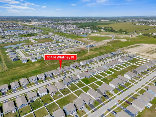 a view of an ocean with building in the background