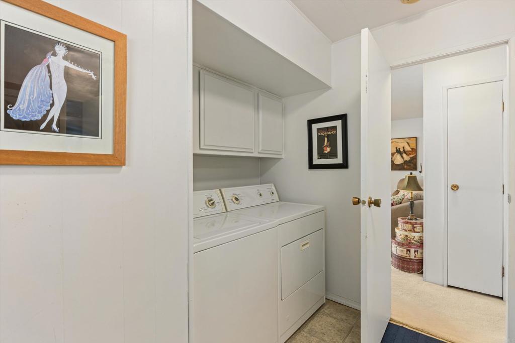 650 South Rancho Santa Fe Road, Unit 256 San Marcos, CA 92078 - Photo 26 of 60 a utility room with dryer and washer