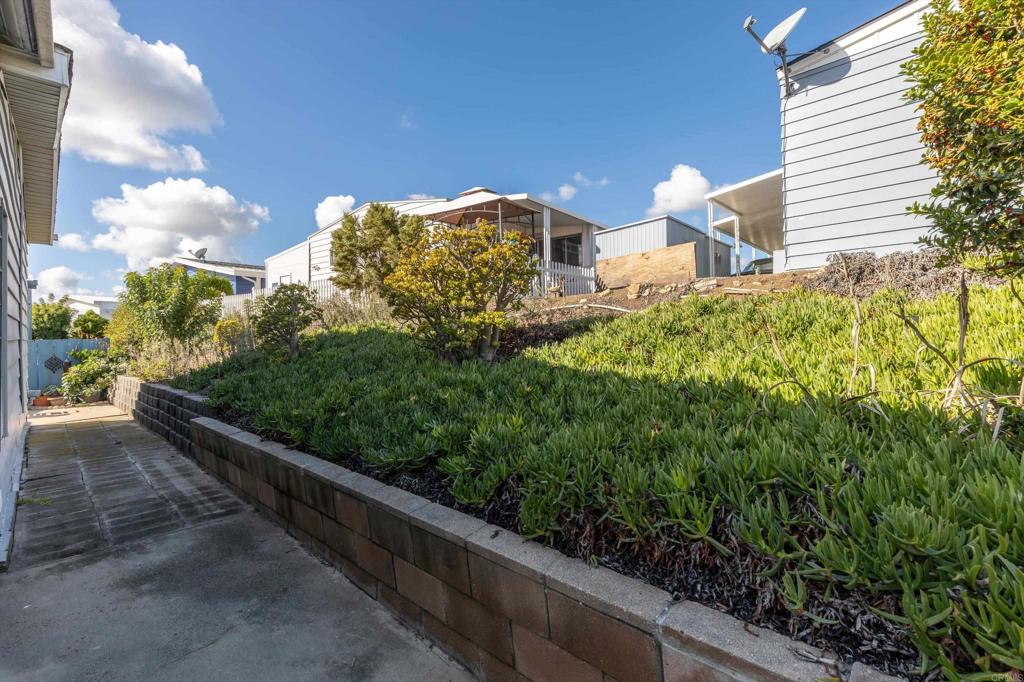 650 South Rancho Santa Fe Road, Unit 256 San Marcos, CA 92078 - Photo 30 of 60 a view of a balcony with two chairs
