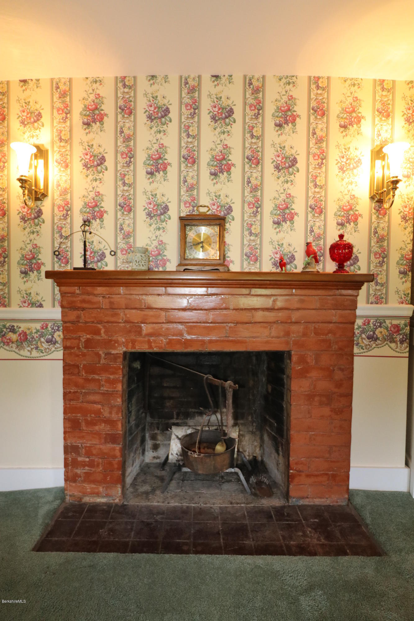 22 Summit Road Richmond, MA 01254 - Photo 16 of 52 a fireplace with a table