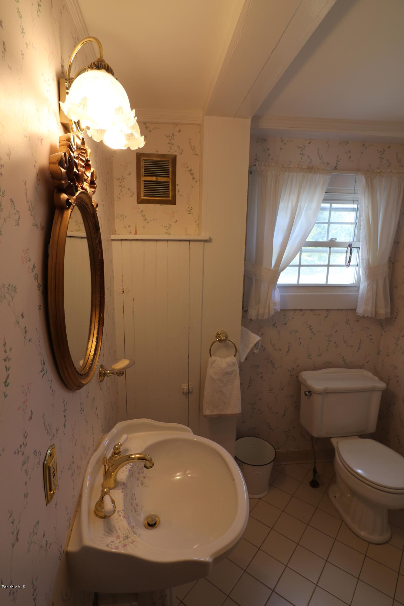 22 Summit Road Richmond, MA 01254 - Photo 21 of 52 a bathroom with a sink a toilet and a mirror