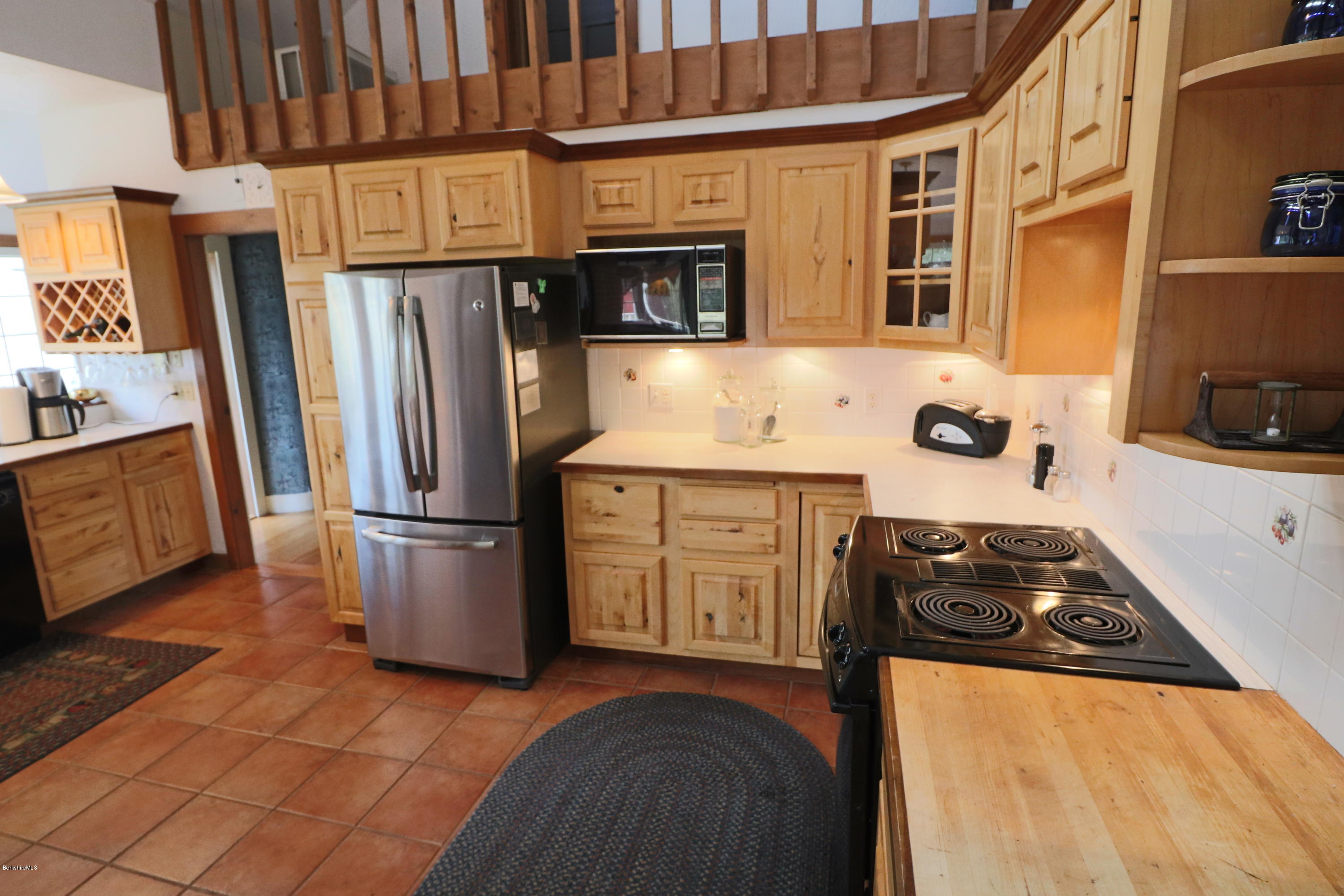 22 Summit Road Richmond, MA 01254 - Photo 28 of 52 a kitchen with a refrigerator stove and sink