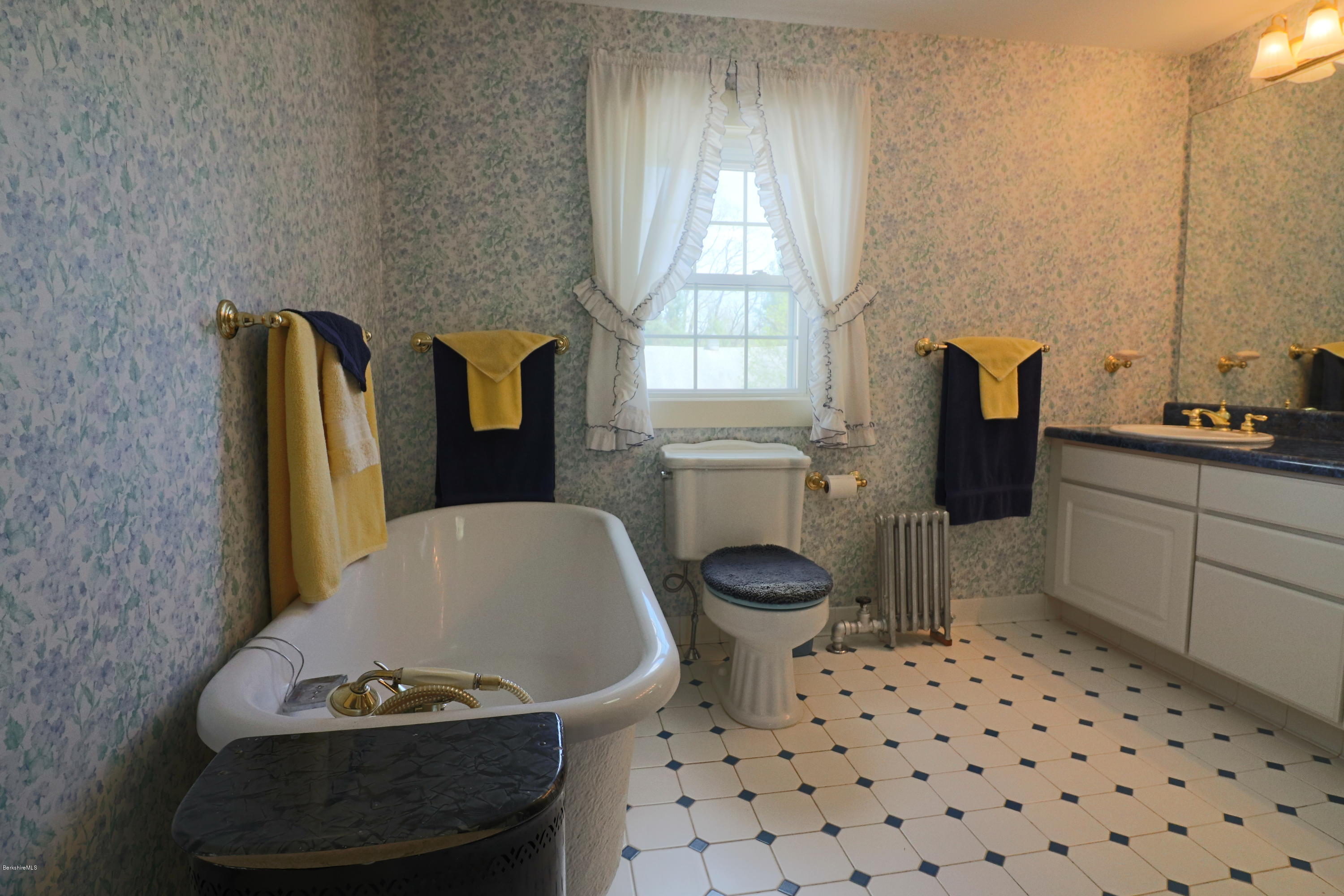 22 Summit Road Richmond, MA 01254 - Photo 41 of 52 a bathroom with a sink toilet and window
