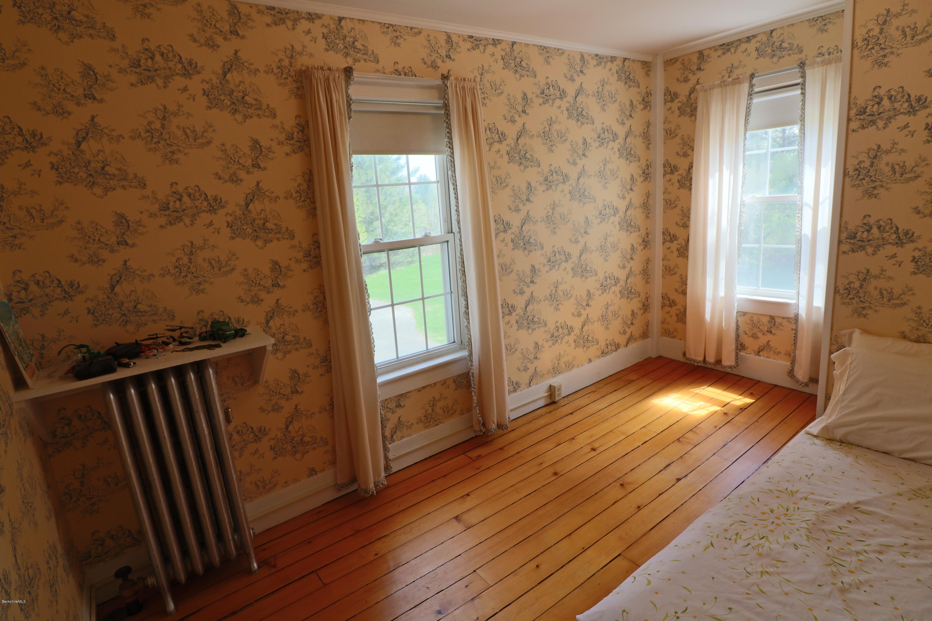 22 Summit Road Richmond, MA 01254 - Photo 43 of 52 a view of wooden floor and windows in a room