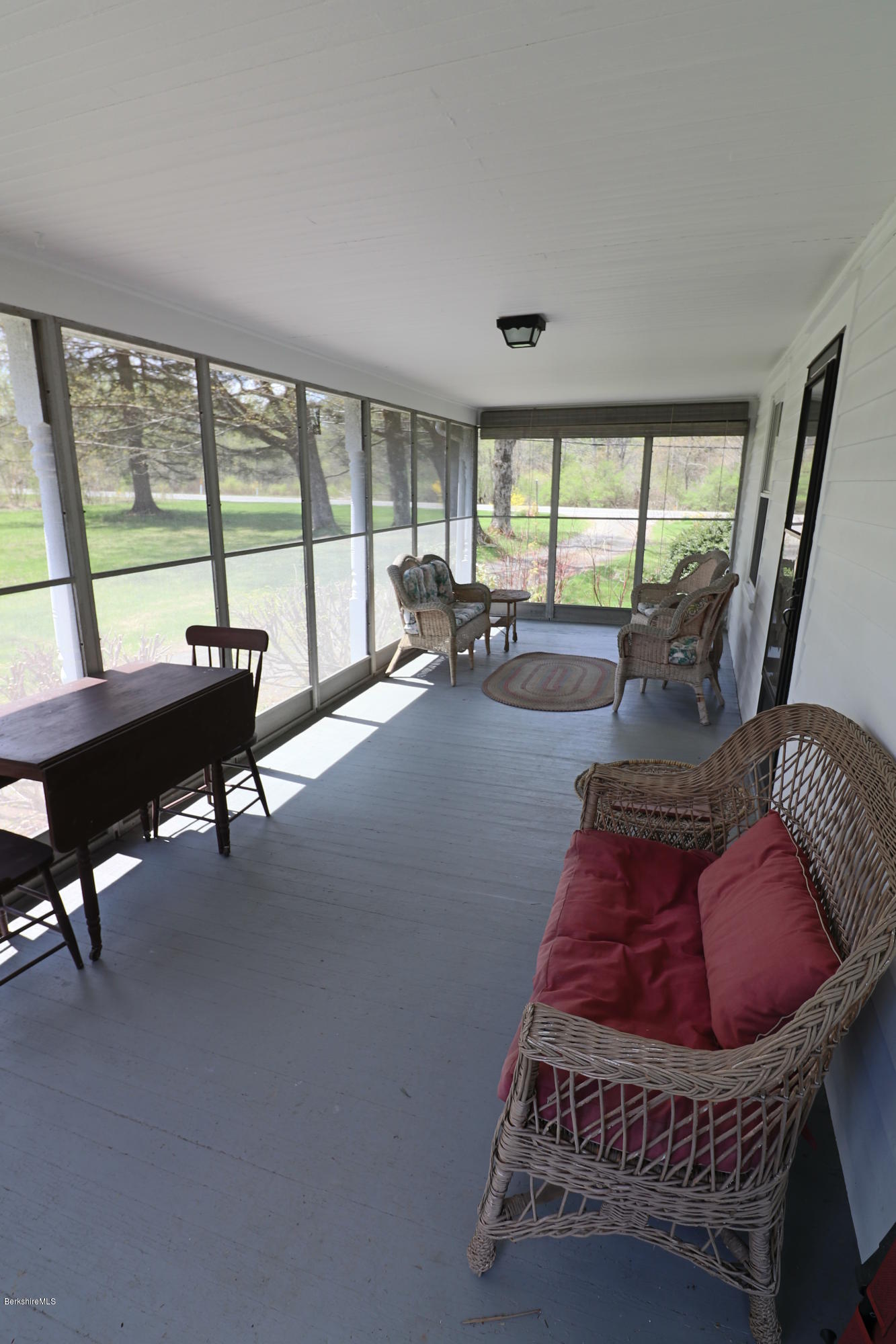22 Summit Road Richmond, MA 01254 - Photo 10 of 52 a living room with furniture and a floor to ceiling window