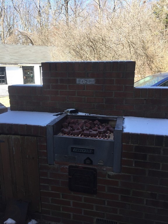 20 Killam Hill Road Boxford, MA 01921 - Photo 19 of 26 a stove top oven sitting inside of a kitchen