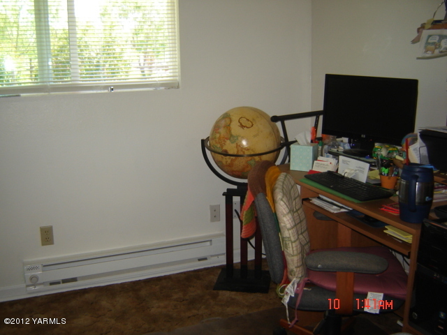 1091 Deeringhoff Road Moxee, WA 98936 - Photo 7 of 12 a room with storage and utility
