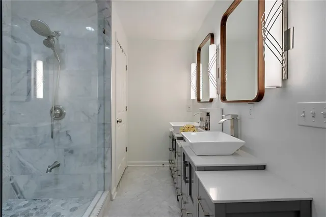 a bathroom with a sink and a mirror