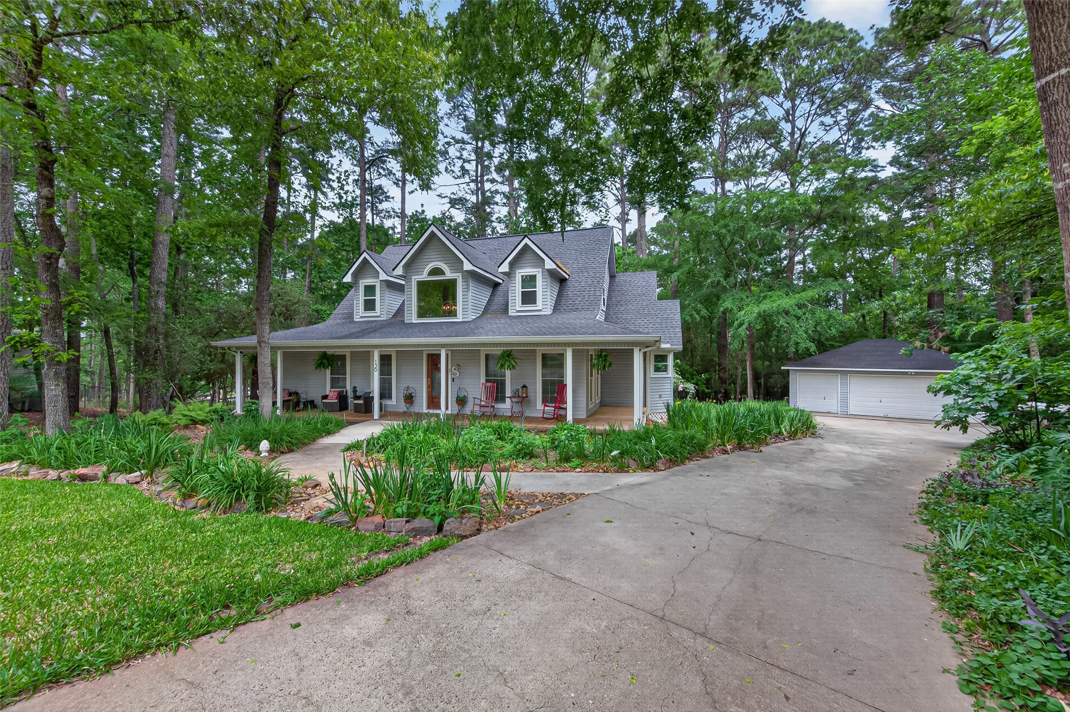 130 North Fairway Loop Coldspring, TX 77331 - Photo 2 of 49 Don't miss the amazing landscaping