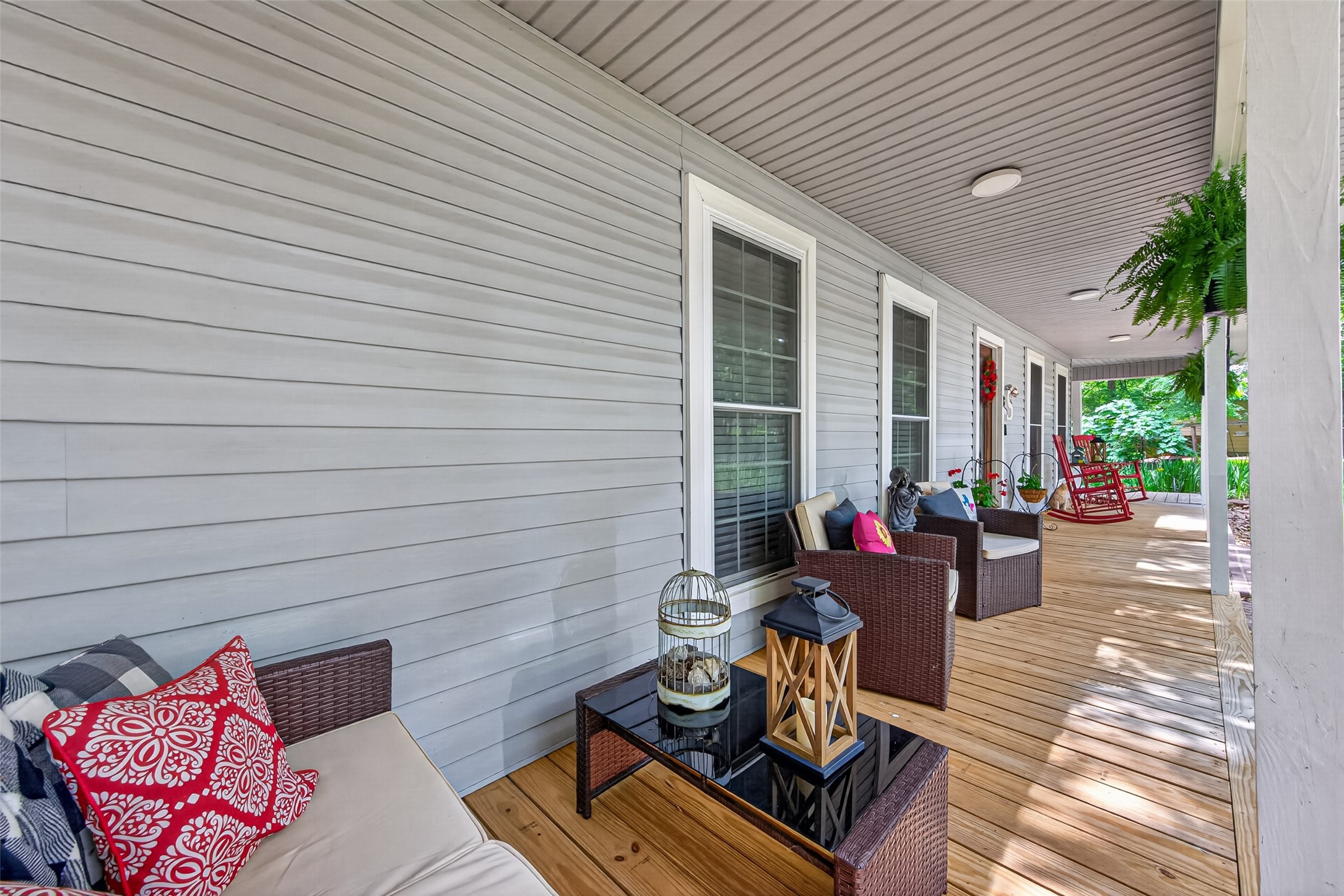 130 North Fairway Loop Coldspring, TX 77331 - Photo 6 of 49 Front porch stretches across the front of the house.