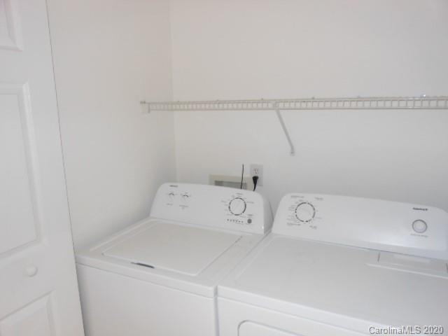 14018 Dingess Road Charlotte, NC 28273 - Photo 13 of 14 a utility room with dryer and washer