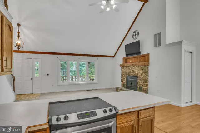 a view of a yard with porch and garden