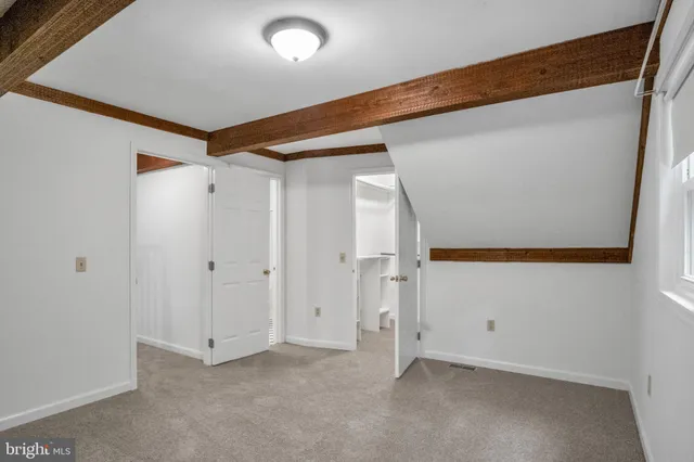 a view of an empty walk in closet