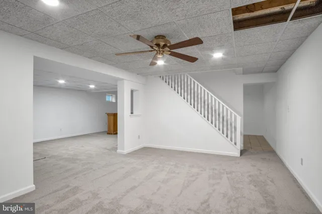 a kitchen with a stove and a refrigerator
