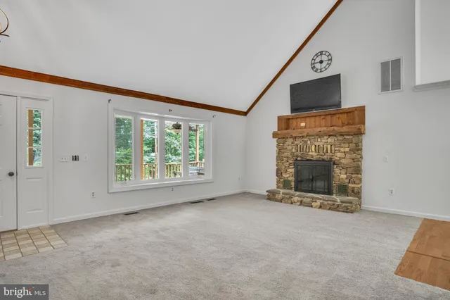 a view of a livingroom with a fireplace