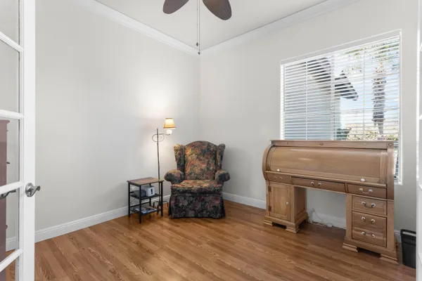 a room with furniture and a window