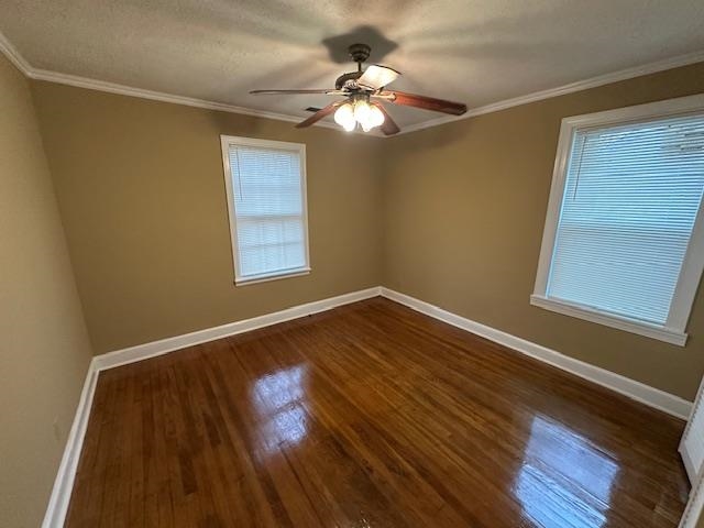 842 South Graham Street Memphis, TN 38111 - Photo 11 of 14 a view of an empty room with wooden floor and a window