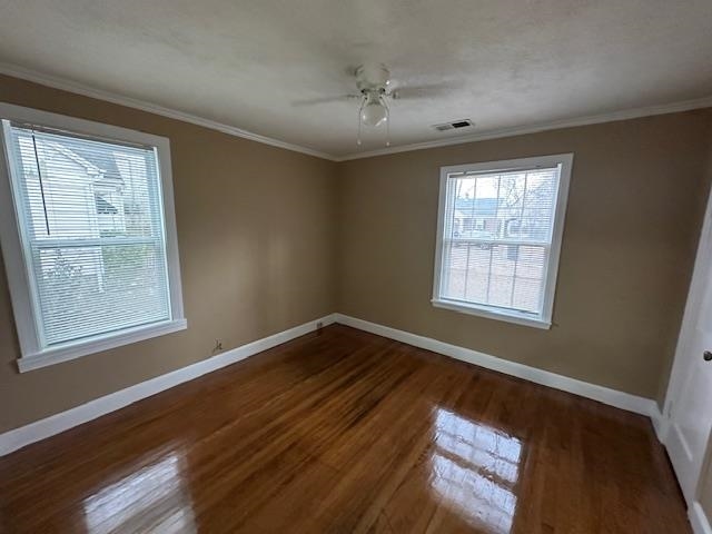 842 South Graham Street Memphis, TN 38111 - Photo 10 of 14 a view of an empty room with a window and wooden floor