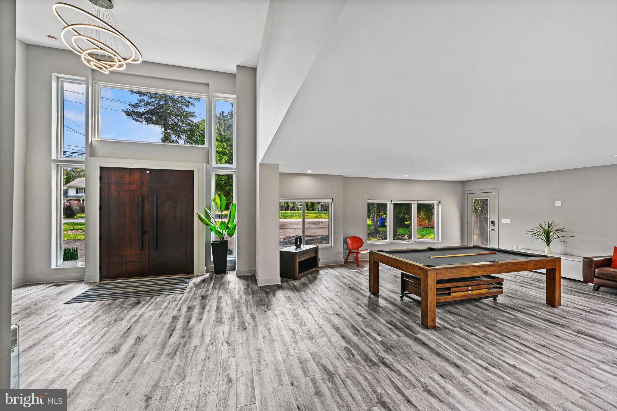10530 Stevenson Road Stevenson, MD 21153 - Photo 11 of 98 a view of a livingroom with furniture wooden floor a fireplace and windows