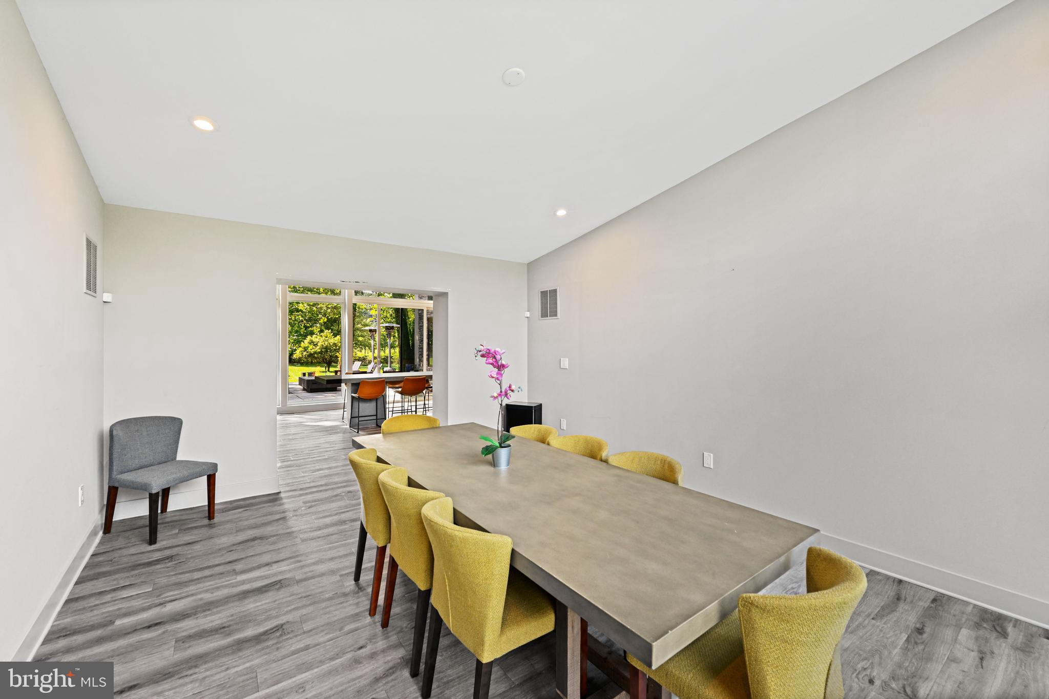 10530 Stevenson Road Stevenson, MD 21153 - Photo 22 of 98 a view of a dining room with furniture and wooden floor