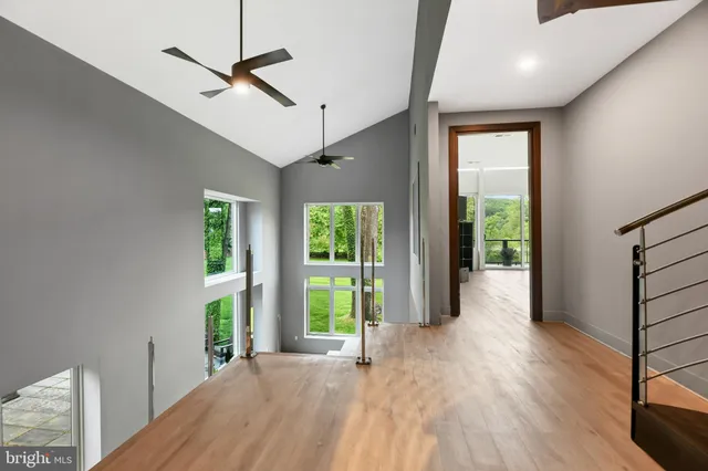 a view of a dining room with furniture and window