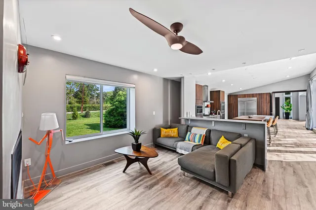 a bed room with a bed and a chair