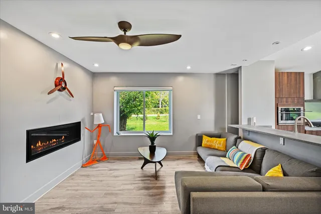 a view of wooden floor and chair in a room