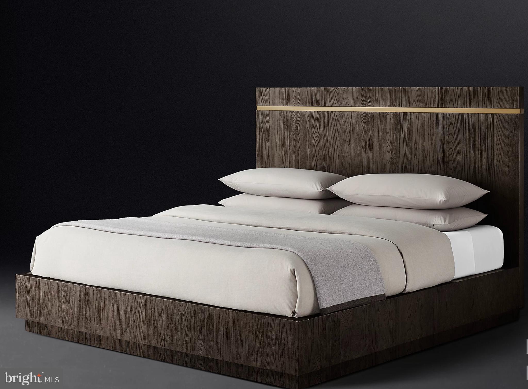 10530 Stevenson Road Stevenson, MD 21153 - Photo 47 of 98 a bed sitting in a bedroom next to a cabinet