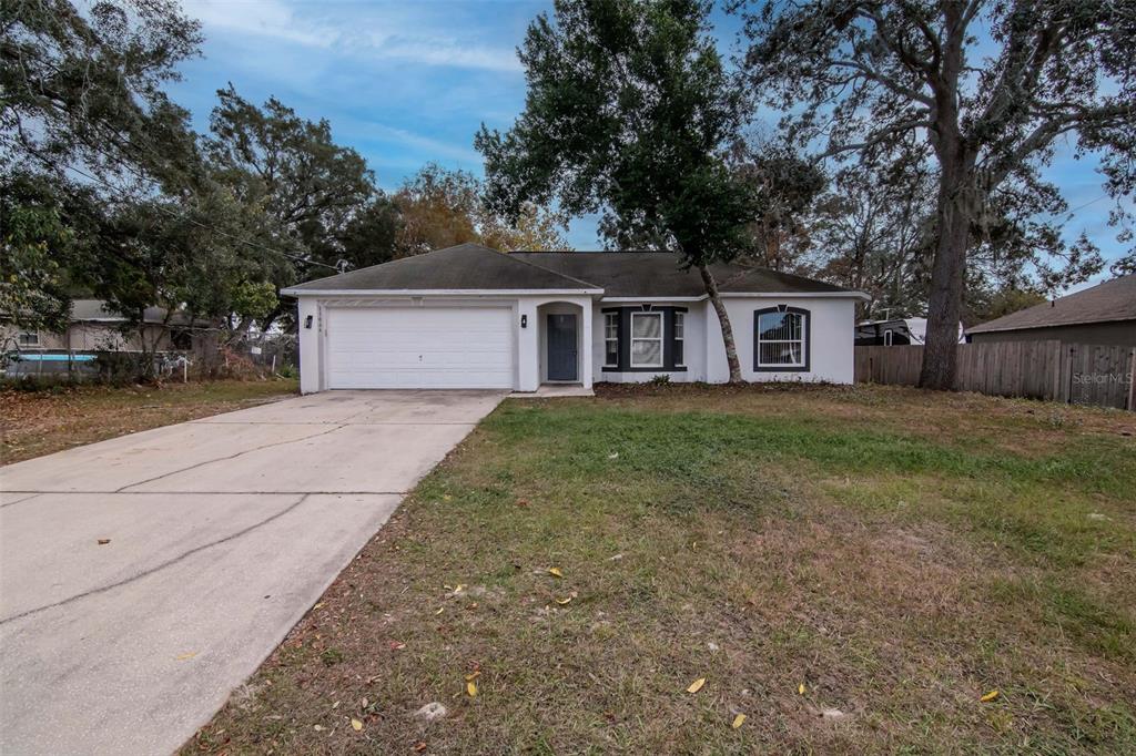 11066 Avis Street Spring Hill, FL 34608 - Photo 2 of 33