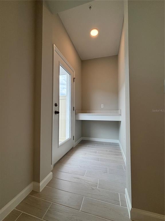 660 Pothos Street Apopka, FL 32703 - Photo 13 of 32 a view of an empty room and a window