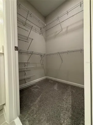 a view of a room with racks on the wall