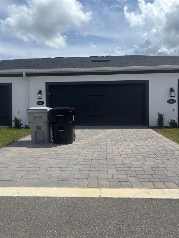 660 Pothos Street Apopka, FL 32703 - Photo 29 of 32 a front view of a house with a yard