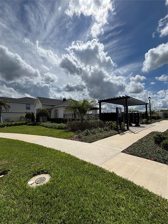 660 Pothos Street Apopka, FL 32703 - Photo 30 of 32 a view of outdoor space with yard and green space