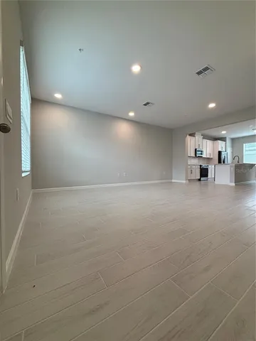 a view of a room with an empty space