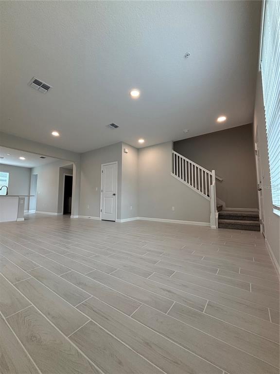 660 Pothos Street Apopka, FL 32703 - Photo 4 of 32 a view of an empty room with a window